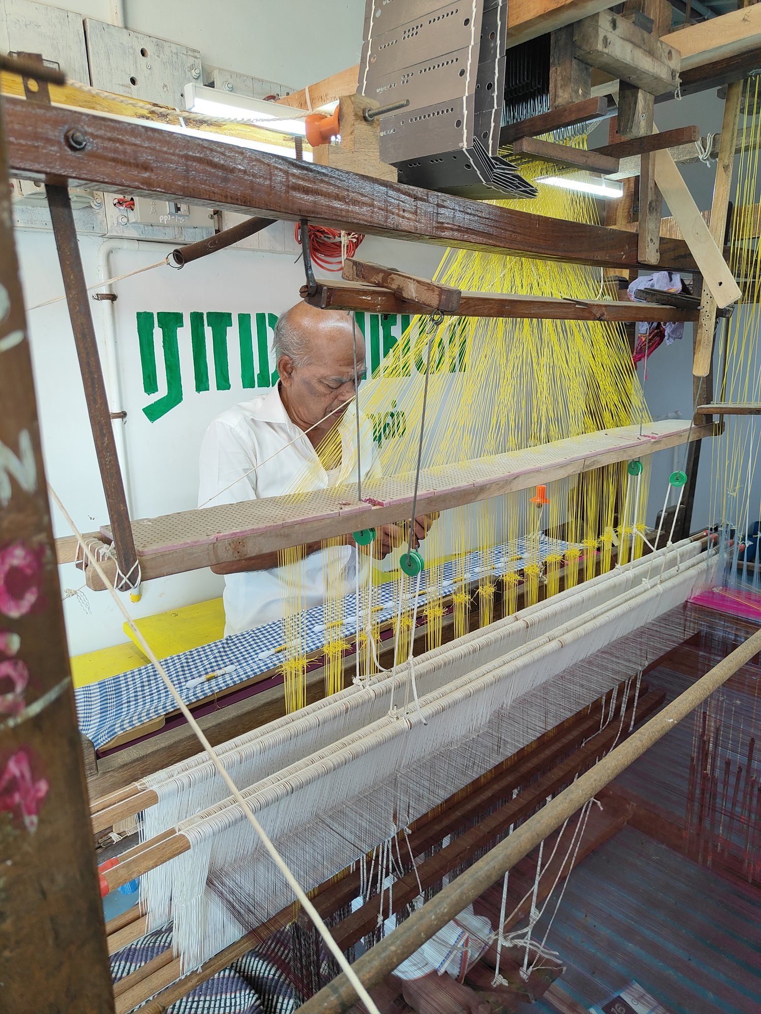 Master weaver working at a Ramalingaa Silk House handloom